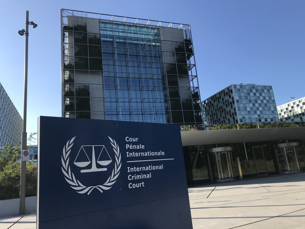 The frontage of the international criminal court (ICC), with its logo in the foreground. Is the ICC biased?