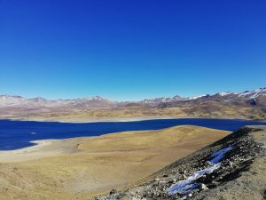brown and white mountains under blue sky during daytime